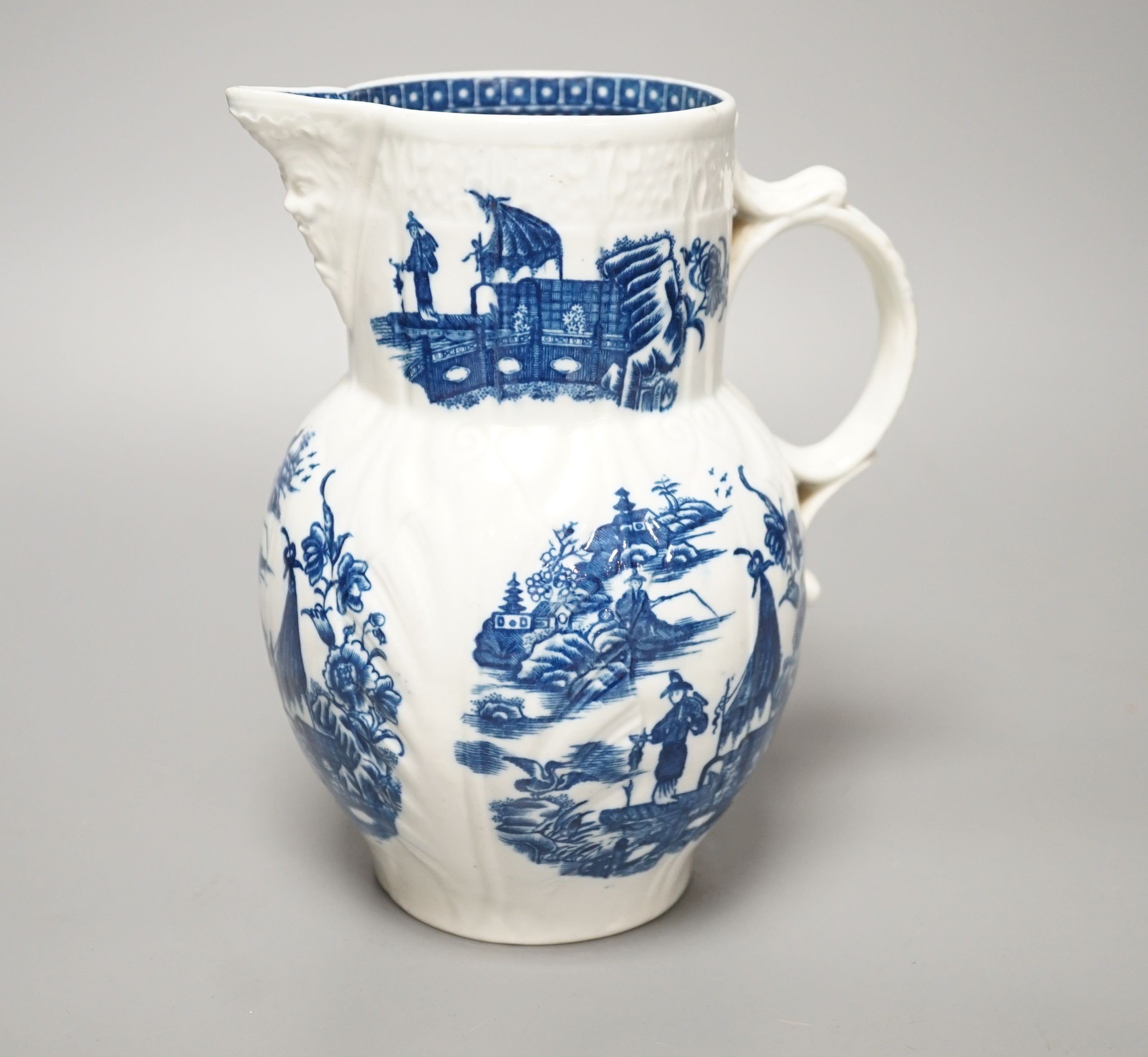A Caughley mask jug printed with Fisherman pattern, c.1785, S mark, height 19cm